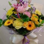 Boxed Aqua Arrangement With Lilies Roses Gerbra And Carnations in Accrington Lancashire